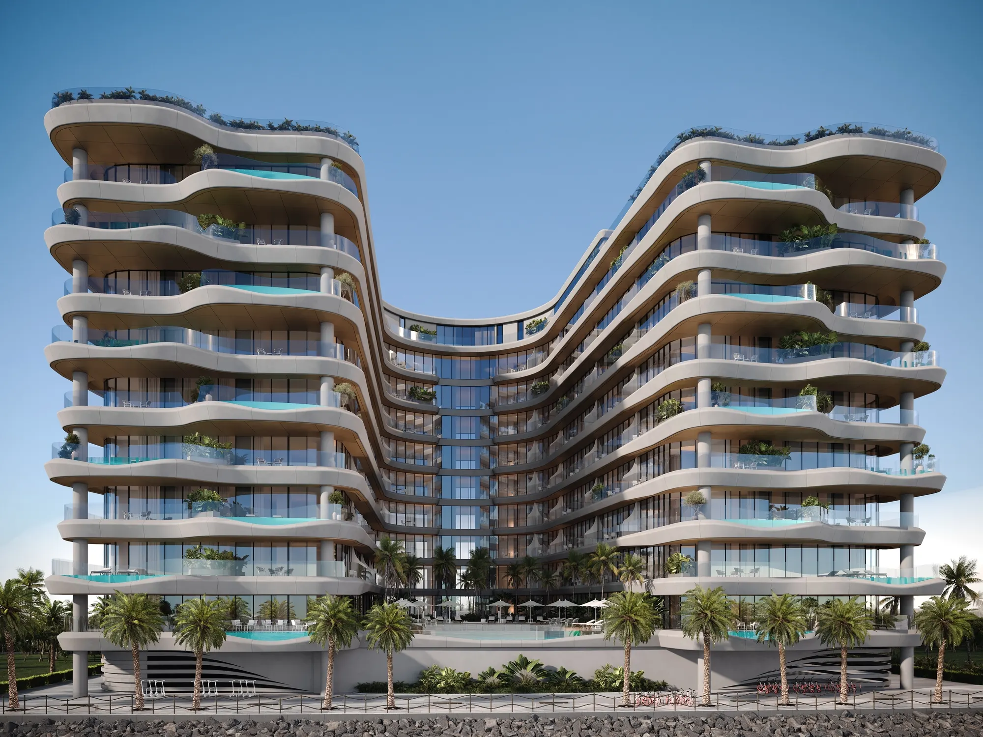 Fachada de Gianfranco Ferré Residences en Al Marjan Island, con diseño curvo en forma de U y piscinas privadas en las terrazas