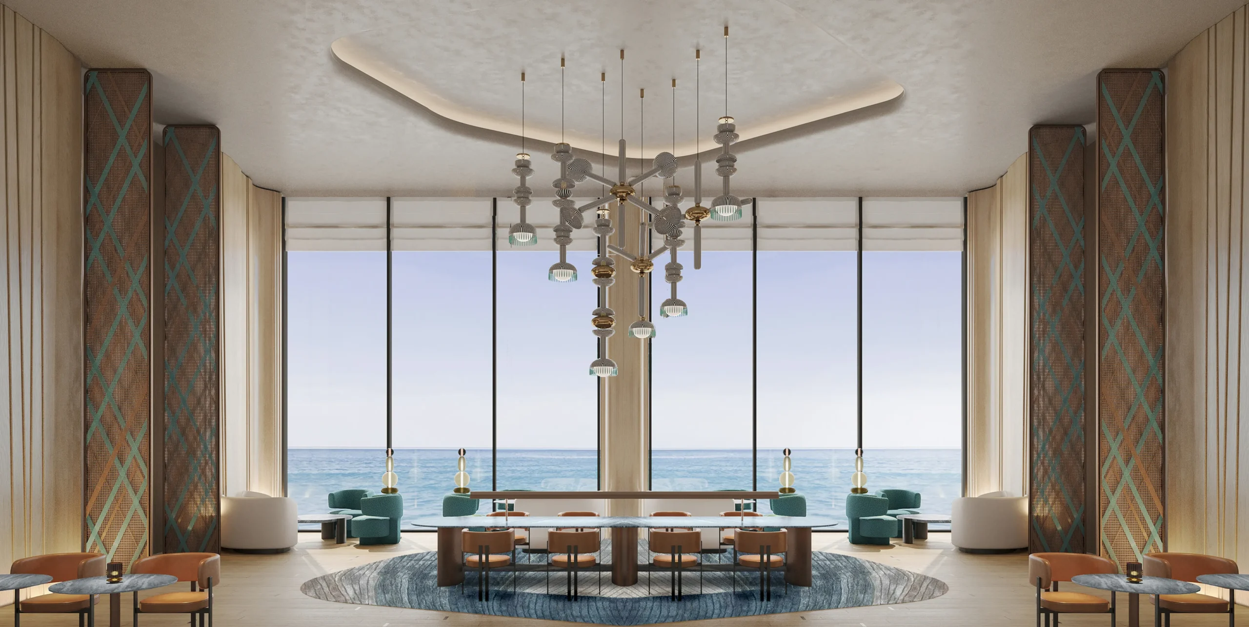 Salón para residentes de W by Marriott Al Marjan Island con mesa larga, lámpara escultural y ventanales con vistas frontales al mar